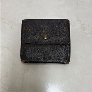 Distressed Louis Vuitton wallet